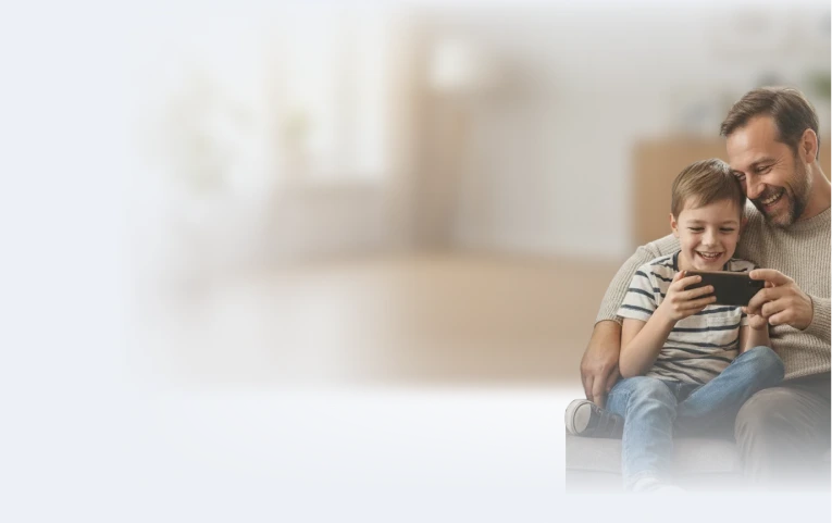 Father and son with phone